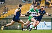 26 March 2023; Eoghan Ban Gallagher of Donegal in action against Enda Smith, right, and Conor Hussey of Roscommon during the Allianz Football League Division 1 match between Roscommon and Donegal at Dr Hyde Park in Roscommon. Photo by Sam Barnes/Sportsfile