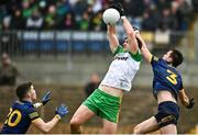 26 March 2023; Hugh McFadden of Donegal  contests a high ball with Brian Stack, right,  and Ruaidhrí Fallon of Roscommon during the Allianz Football League Division 1 match between Roscommon and Donegal at Dr Hyde Park in Roscommon. Photo by Sam Barnes/Sportsfile