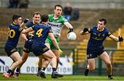 26 March 2023; Hugh McFadden of Donegal in action against, Roscommon players, from left, Ruaidhrí Fallon, Enda Smith, David Murray and Brian Stack during the Allianz Football League Division 1 match between Roscommon and Donegal at Dr Hyde Park in Roscommon. Photo by Sam Barnes/Sportsfile