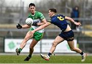 26 March 2023; Michael Langan of Donegal in action against Dylan Ruane of Roscommon during the Allianz Football League Division 1 match between Roscommon and Donegal at Dr Hyde Park in Roscommon. Photo by Sam Barnes/Sportsfile