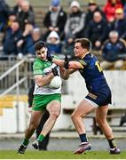 26 March 2023; Caolan McGonagle of Donegal in action against Enda Smith of Roscommon during the Allianz Football League Division 1 match between Roscommon and Donegal at Dr Hyde Park in Roscommon. Photo by Sam Barnes/Sportsfile