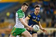 26 March 2023; Eoghan Ban Gallagher of Donegal in action against Conor Hussey of Roscommon during the Allianz Football League Division 1 match between Roscommon and Donegal at Dr Hyde Park in Roscommon. Photo by Sam Barnes/Sportsfile