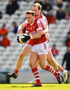 26 March 2023; Steven Sherlock of Cork in action against Padraig Cassidy of Derry during the Allianz Football League Division 2 match between Cork and Derry at Páirc Ui Chaoimh in Cork. Photo by Eóin Noonan/Sportsfile