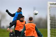 26 March 2023; Adam Idah wins a head against Andrew Omobamidele during a Republic of Ireland training session at the FAI National Training Centre in Abbotstown, Dublin. Photo by Stephen McCarthy/Sportsfile