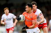 26 March 2023; Jemar Hall of Armagh in action against Darren McCurry of Tyrone during the Allianz Football League Division 1 match between Tyrone and Armagh at O'Neill's Healy Park in Omagh, Tyrone. Photo by Ramsey Cardy/Sportsfile