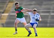 26 March 2023; Stephen O'Hanlon of Monaghan in action against Padraig O'Hora of Mayo during the Allianz Football League Division 1 match between Mayo and Monaghan at Hastings Insurance MacHale Park in Castlebar, Mayo. Photo by Ben McShane/Sportsfile