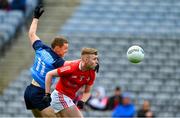 26 March 2023; Peter Lynch of Louth in action against Con O'Callaghan of Dublin during the Allianz Football League Division 2 match between Dublin and Louth at Croke Park in Dublin. Photo by Ray McManus/Sportsfile