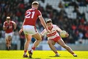26 March 2023; Shane McGuigan of Derry in action against Killian O’Hanlon of Cork during the Allianz Football League Division 2 match between Cork and Derry at Páirc Ui Chaoimh in Cork. Photo by Eóin Noonan/Sportsfile