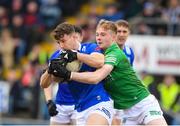 26 March 2023; Conor Madden of Cavan in action against Brandon Horan of Fermanagh during the Allianz Football League Division 3 match between Cavan and Fermanagh at Kingspan Breffni in Cavan. Photo by Matt Browne/Sportsfile