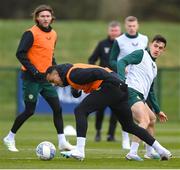 26 March 2023; Adam Idah is tackled by Jamie McGrath during a Republic of Ireland training session at the FAI National Training Centre in Abbotstown, Dublin. Photo by Stephen McCarthy/Sportsfile