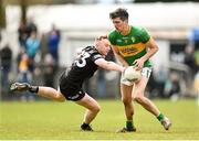 26 March 2023; Mark Walsh of Sligo in action against Pearce Dolan of Leitrim during the Allianz Football League Division 4 match between Leitrim and Sligo at Avant Money Páirc Seán Mac Diarmada in Carrick-on-Shannon, Leitrim. Photo by Stephen Marken/Sportsfile