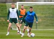 26 March 2023; Jason Knight with Nathan Collins, left, and Evan Ferguson, centre, during a Republic of Ireland training session at the FAI National Training Centre in Abbotstown, Dublin. Photo by Stephen McCarthy/Sportsfile