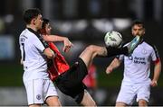 17 March 2023; Cian Kavanagh of Derry City in action against Éanna Clancy of Sligo Rovers during the SSE Airtricity Men's Premier Division match between Derry City and Sligo Rovers at The Ryan McBride Brandywell Stadium in Derry. Photo by Stephen McCarthy/Sportsfile