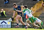 26 March 2023; Enda Smith of Roscommon in action against Caolan Ward of Donegal during the Allianz Football League Division 1 match between Roscommon and Donegal at Dr Hyde Park in Roscommon. Photo by Sam Barnes/Sportsfile
