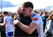 26 March 2023; Thomas McPhillips of Monaghan celebrates with a supporter after the Allianz Football League Division 1 match between Mayo and Monaghan at Hastings Insurance MacHale Park in Castlebar, Mayo. Photo by Ben McShane/Sportsfile