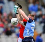26 March 2023; Paddy Small of Dublin in action against Peter Lynch of Louth during the Allianz Football League Division 2 match between Dublin and Louth at Croke Park in Dublin. Photo by Ray McManus/Sportsfile