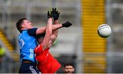 26 March 2023; Ciarán Kilkenny of Dublin in action against Conall McCaul of Louth during the Allianz Football League Division 2 match between Dublin and Louth at Croke Park in Dublin. Photo by Ray McManus/Sportsfile