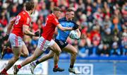 26 March 2023; Paddy Small of Dublin in action against Peter Lynch, 3, and Bevan Duffy of Louth during the Allianz Football League Division 2 match between Dublin and Louth at Croke Park in Dublin. Photo by Ray McManus/Sportsfile