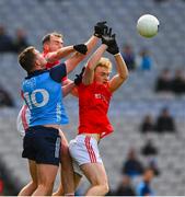 26 March 2023; Ciarán Kilkenny of Dublin in action against Conor Early, left, and Leonard Grey of Louth during the Allianz Football League Division 2 match between Dublin and Louth at Croke Park in Dublin. Photo by Ray McManus/Sportsfile