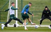 26 March 2023; Jason Knight in action against Alan Browne, left, during a Republic of Ireland training session at the FAI National Training Centre in Abbotstown, Dublin. Photo by Stephen McCarthy/Sportsfile