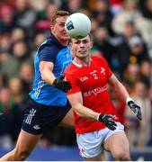 26 March 2023; Dan Corcoran of Louth in action against Ciarán Kilkenny of Dublin during the Allianz Football League Division 2 match between Dublin and Louth at Croke Park in Dublin. Photo by Ray McManus/Sportsfile