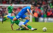 26 March 2023; Kristofer Jonsson of Iceland is tackled by Killian Phillips of Republic of Ireland during the Under-21 international friendly match between Republic of Ireland and Iceland at Turners Cross in Cork. Photo by Seb Daly/Sportsfile