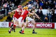 26 March 2023; Billy Drennan of Kilkenny is tackled by Cork players, from left, Damien Cahalane, Ciarán Joyce and Niall O’Leary resulting in a penalty being awarded during the Allianz Hurling League Division 1 Semi Final match between Kilkenny and Cork at UMPC Nowlan Park in Kilkenny. Photo by David Fitzgerald/Sportsfile