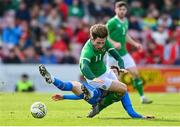 26 March 2023; Ollie O’Neill of Republic of Ireland is tackled by Andri Hoti of Iceland during the Under-21 international friendly match between Republic of Ireland and Iceland at Turners Cross in Cork. Photo by Seb Daly/Sportsfile