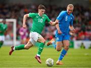 26 March 2023; Andrew Moran of Republic of Ireland in action against Olafur Guomundsson of Iceland during the Under-21 international friendly match between Republic of Ireland and Iceland at Turner's Cross in Cork. Photo by Michael P Ryan/Sportsfile
