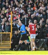26 March 2023; Referee John Keenan shows a red card to Eoin Downey of Cork during the Allianz Hurling League Division 1 Semi Final match between Kilkenny and Cork at UMPC Nowlan Park in Kilkenny. Photo by David Fitzgerald/Sportsfile