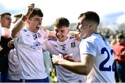 26 March 2023; Monaghan players, from left, Jason Irwin, Thomas McPhillips and Karl O'Connell celebrate after the Allianz Football League Division 1 match between Mayo and Monaghan at Hastings Insurance MacHale Park in Castlebar, Mayo. Photo by Ben McShane/Sportsfile