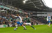 26 March 2023; Anssi Suhonen of Finland in action against Conor Bradley of Northern Ireland during the UEFA EURO 2024 Championship Qualifier match between Northern Ireland and Finland at National Stadium at Windsor Park in Belfast. Photo by Ramsey Cardy/Sportsfile