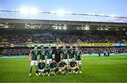 26 March 2023; The Northern Ireland team back row from left, Paddy McNair, Shea Charles, Craig Cathcart, Bailey Peacock-Farrell, Ciaron Brown, Daniel Ballard and Dion Charles, alongside front row, from left, Conor Bradley, Jamal Lewis, Conor Washington and Jordan Thompson before the UEFA EURO 2024 Championship Qualifier match between Northern Ireland and Finland at National Stadium at Windsor Park in Belfast. Photo by Ramsey Cardy/Sportsfile