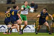 26 March 2023; Hugh McFadden of Donegal in action against, Roscommon players, from left, Ruaidhrí Fallon, Enda Smith, David Murray and Brian Stack during the Allianz Football League Division 1 match between Roscommon and Donegal at Dr Hyde Park in Roscommon. Photo by Sam Barnes/Sportsfile