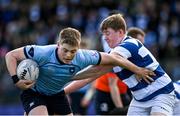 27 March 2023; Conor Canniffe of St Michael’s College is tackled by Luka Kelly of Blackrock College during the Bank of Ireland Leinster Rugby Schools Junior Cup Final match between St Michael's College and Blackrock College at Energia Park in Dublin. Photo by Harry Murphy/Sportsfile