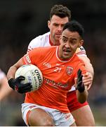 26 March 2023; Jemar Hall of Armagh in action against Darren McCurry of Tyrone during the Allianz Football League Division 1 match between Tyrone and Armagh at O'Neill's Healy Park in Omagh, Tyrone. Photo by Ramsey Cardy/Sportsfile