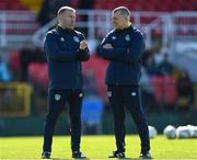 26 March 2023; Republic of Ireland assistant coaches Alan Reynolds, left, and Trevor Croly before the Under-21 international friendly match between Republic of Ireland and Iceland at Turners Cross in Cork. Photo by Seb Daly/Sportsfile