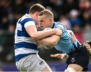 27 March 2023; Setanta McLaughlin of St Michael’s College is tackled by Tom Keaveney of Blackrock College during the Bank of Ireland Leinster Rugby Schools Junior Cup Final match between St Michael's College and Blackrock College at Energia Park in Dublin. Photo by Harry Murphy/Sportsfile