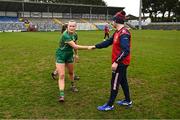 25 March 2023; Vikki Wall of Meath shakes hands with Cork manager Shane Ronayne after the Lidl Ladies National Football League Division 1 Round 7 match between Cork and Meath at Pairc Ui Rinn in Cork. Photo by Eóin Noonan/Sportsfile