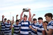 27 March 2023; Lorcan Golden of Blackrock College lifts the trophy after their side's victory in the Bank of Ireland Leinster Rugby Schools Junior Cup Final match between St Michael's College and Blackrock College at Energia Park in Dublin. Photo by Harry Murphy/Sportsfile
