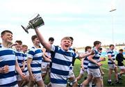 27 March 2023; Blackrock College captain Matthew Wyse celebrates with the trophy after his side's victory in the Bank of Ireland Leinster Rugby Schools Junior Cup Final match between St Michael's College and Blackrock College at Energia Park in Dublin. Photo by Harry Murphy/Sportsfile