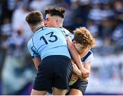 27 March 2023; Cael McCloskey of Blackrock College is tackled by Matthew Haugh and Scott Barron of St Michael’s College during the Bank of Ireland Leinster Rugby Schools Junior Cup Final match between St Michael's College and Blackrock College at Energia Park in Dublin. Photo by Harry Murphy/Sportsfile