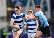 27 March 2023; Bernard White of Blackrock College is tackled by Matthew Haugh of St Michael’s College  during the Bank of Ireland Leinster Rugby Schools Junior Cup Final match between St Michael's College and Blackrock College at Energia Park in Dublin. Photo by Harry Murphy/Sportsfile