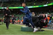 27 March 2023; Kylian Mbappé of France makes his way out for the warm ups before the UEFA EURO 2024 Championship Qualifier match between Republic of Ireland and France at Aviva Stadium in Dublin. Photo by Michael P Ryan/Sportsfile