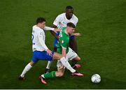 27 March 2023; Evan Ferguson of Republic of Ireland in action against Benjamin Pavard, left, and Ibrahima Konaté of France during the UEFA EURO 2024 Championship Qualifier match between Republic of Ireland and France at Aviva Stadium in Dublin. Photo by Piaras Ó Mídheach/Sportsfile