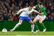 27 March 2023; Kylian Mbappé of France in action against Seamus Coleman of Republic of Ireland during the UEFA EURO 2024 Championship Qualifier match between Republic of Ireland and France at Aviva Stadium in Dublin. Photo by Stephen McCarthy/Sportsfile