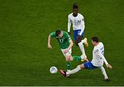 27 March 2023; Jason Knight of Republic of Ireland is fouled by Benjamin Pavard of France, as Eduardo Camavinga of France looks on during the UEFA EURO 2024 Championship Qualifier match between Republic of Ireland and France at Aviva Stadium in Dublin. Photo by Piaras Ó Mídheach/Sportsfile
