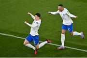 27 March 2023; Benjamin Pavard of France, left, celebrates with team-mate Kylian Mbappé after scoring their side's first goal during the UEFA EURO 2024 Championship Qualifier match between Republic of Ireland and France at Aviva Stadium in Dublin. Photo by Piaras Ó Mídheach/Sportsfile