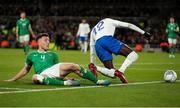 27 March 2023; Dara O'Shea of Republic of Ireland in action against Randal Kolo Muani of France during the UEFA EURO 2024 Championship Qualifier match between Republic of Ireland and France at Aviva Stadium in Dublin. Photo by Michael P Ryan/Sportsfile