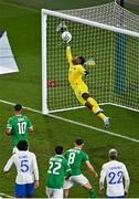 27 March 2023; France goalkeeper Mike Maignan saves the header from Nathan Collins of Republic of Ireland in the closing moments of the UEFA EURO 2024 Championship Qualifier match between Republic of Ireland and France at Aviva Stadium in Dublin. Photo by Piaras Ó Mídheach/Sportsfile